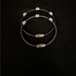 Wire cable and silver tone bracelets with crystal